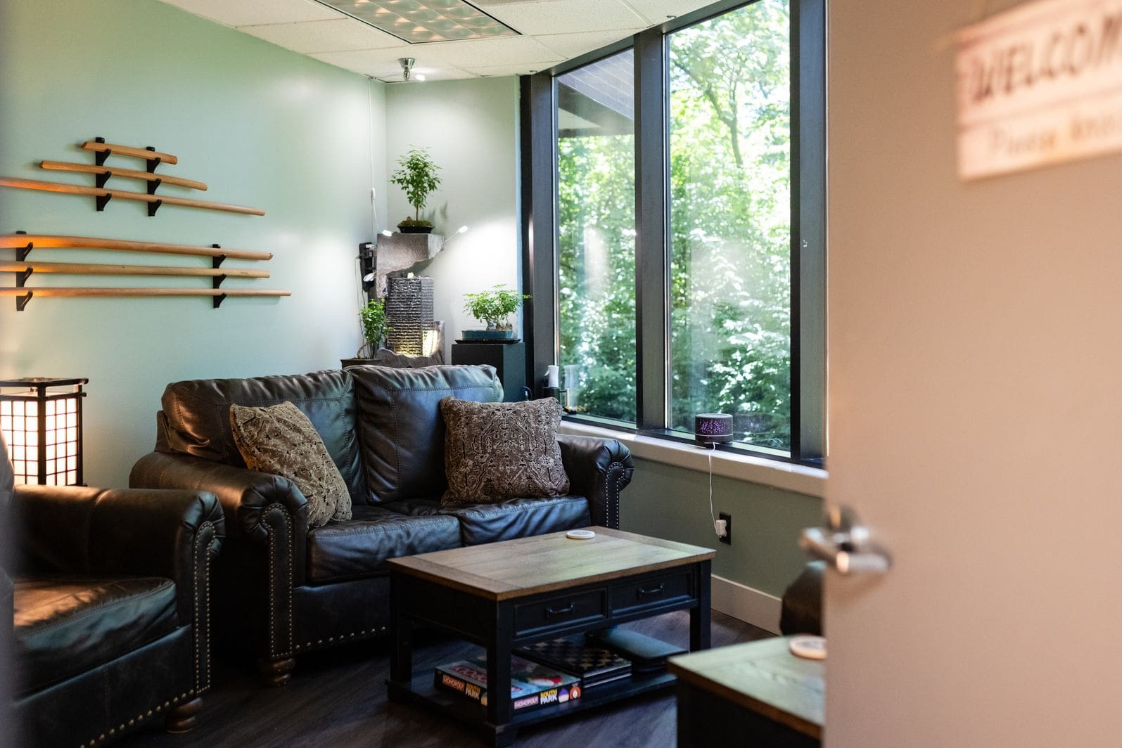 A living room with a couch and coffee table