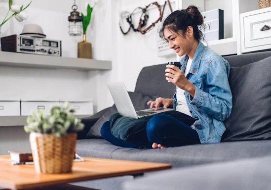 A woman speaks to her therapist during an online therapy session